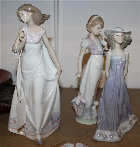 Lladro figure, girl with umbrella, girl with cat, bird & a girl in a hat